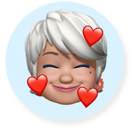 Memoji sonriendo - una mujer mayor con el pelo corto y blanco
